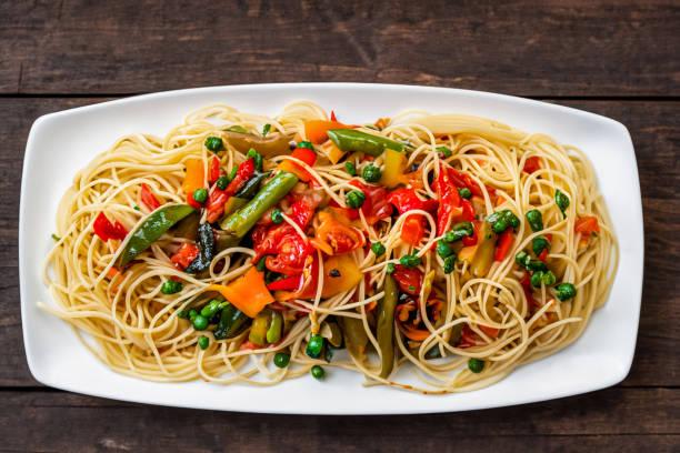istock African traditional Spaghetti pasta with vegetable and sauce 1576180735