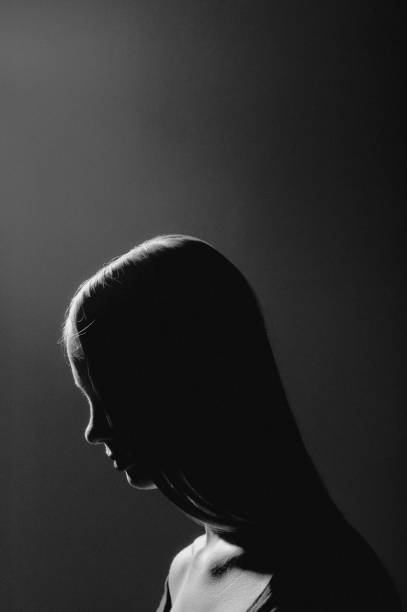 Greyscale photo of a long haired woman stock photo