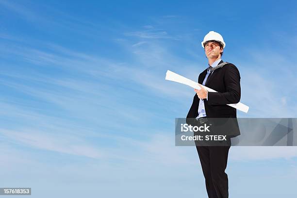 Successful Architect Holding A Blueprint With Copy Space Stock Photo - Download Image Now