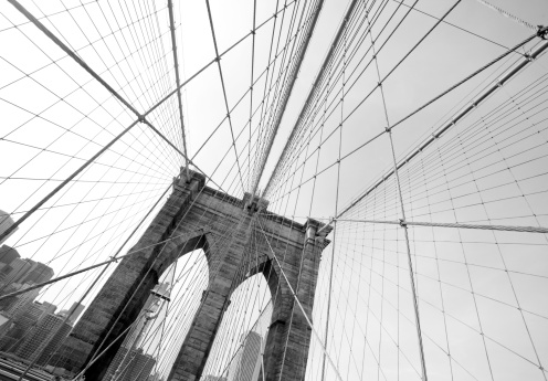 Brooklyn Bridge Detail in New York City in black and white on an overcast day