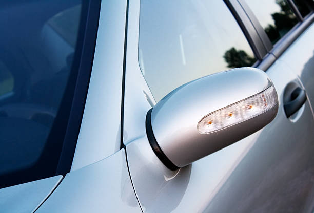 istock silver car , fokus on the mirror with indicator 157618937