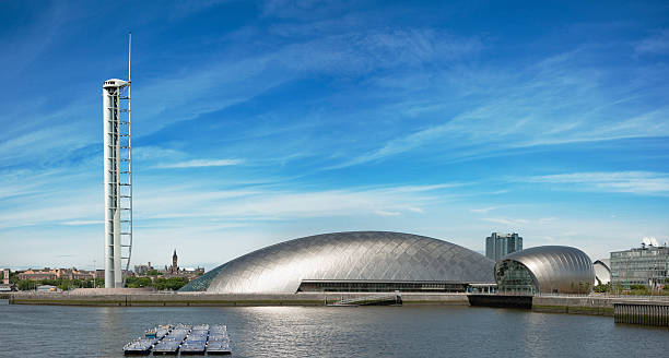 Glasgow Science Centre The Science Tower and titanium-clad domes of the IMAX theatre and exhibit hall at Glasgow's Science Centre. clyde river stock pictures, royalty-free photos & images