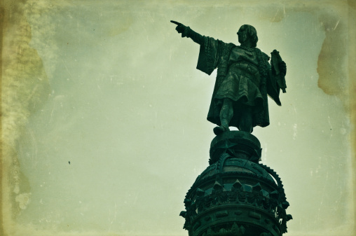 Christopher Columbus statue in barcelona, his hands is pointing to the americas.