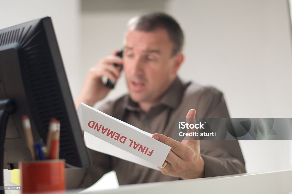 final demand businessman gets red letter Financial Bill Stock Photo