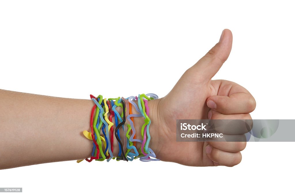 Silly forma elastico bracciali mano con pollice-Up - Foto stock royalty-free di Braccialetto