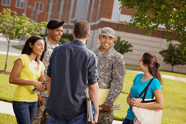 istock Group of students conversing on ROTC military campus 157619276
