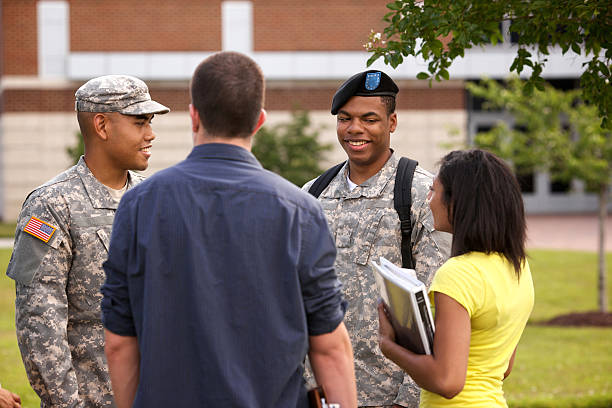 istock Students on campus talking with ROTC soldiers 157619279