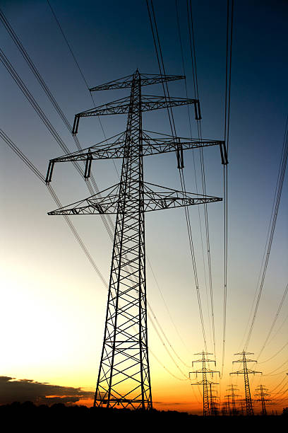 istock high voltage towers in atmospheric sunset 157619363