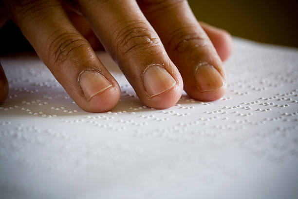 Braille Blind Woman Reading Braille visual sense stock pictures, royalty-free photos & images