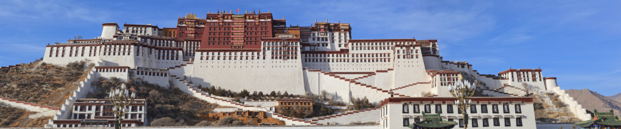 Potala Place panorama under a Tibetan winter sky. The Potala Palace former home of Tibets Dalai Lama. The Potala was both site of the secular government and spiritual leaser the Dalai Lama. The site was used as a palace as early as 637. The current Palace was built starting in 1645 under the 5th Dalai Lama. The Potala is a UNESCO World Heritage Site.