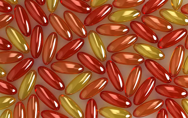 비타민 캡슐 - capsule vitamin pill red lecithin 뉴스 사진 이미지