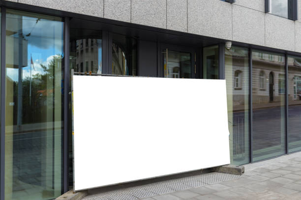 istock Blank white restaurant or shop sign white mockup, large billboard banner on a storefront template. 1576211680