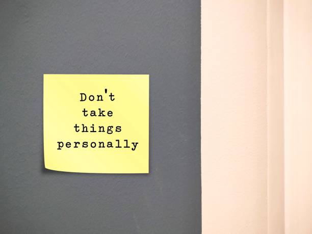 istock Stick note on wall with text written - Dont Take Things Personally - stop being upset because you think that others are criticizing you in particular, convinced that another person comments are about you 1576228029