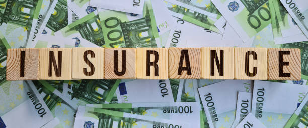 istock Banknotes with one hundred euro and text insurance 1576232395