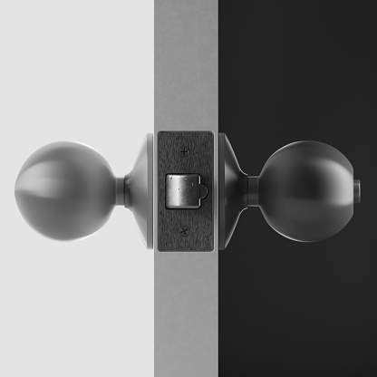 Side view of door knobs facing each other