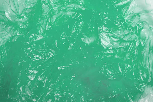 istock Blue plastic bag on white background. A White Plastic Bag Texture, macro, background. Reduction of plastic bags for natural treatment. The symbol of the campaign to refrain from using plastic bags. 1576252693
