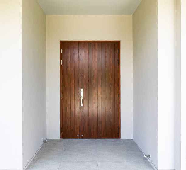 istock Solid teak door entrance to the house 1576253514