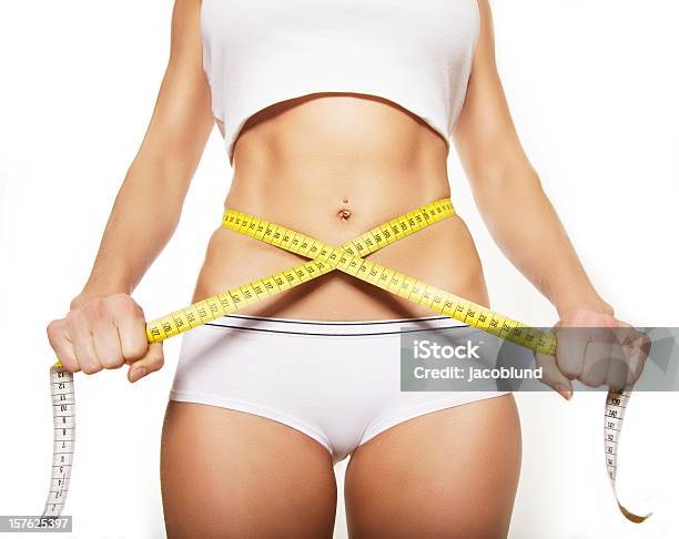 Tape Measure Around A Womans Stomach Stock Photo - Download Image Now - Dieting, Sex Symbol, Women