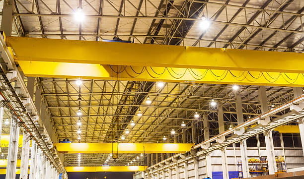 Overhead crane in production line stock photo