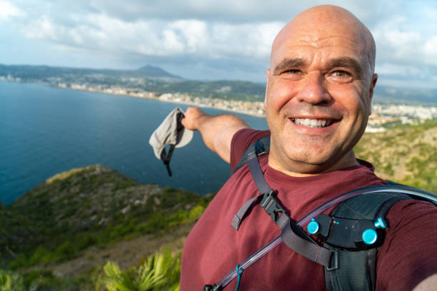 istock Happy hiker takes a selfie outdoors freedom 1576265028
