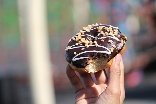 donut with chocolate peanut topping
