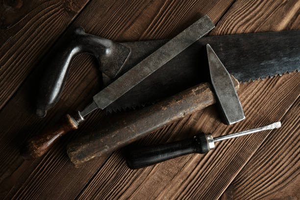 istock Set of tools over a wood panel. Collection of vintage tools. 1576284272