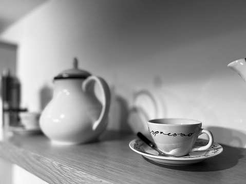 Coffee pot and cup with saucer