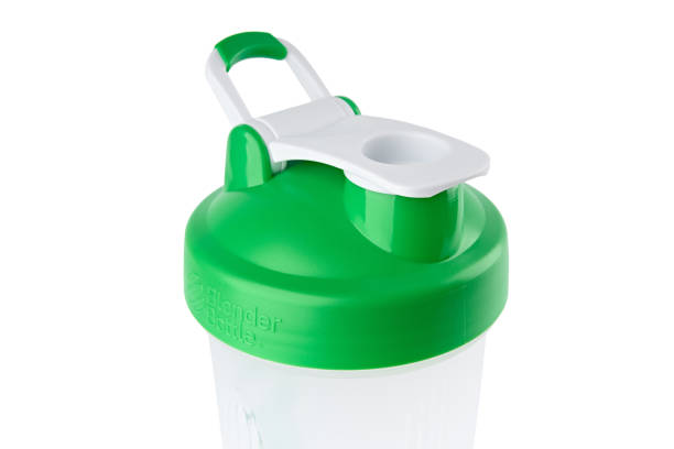 istock Protein shaker iHerb. Shake and blend bottle for mixing and blending nutritional drinks. Plastic shaker isolated on white background with clipping path 1576295439