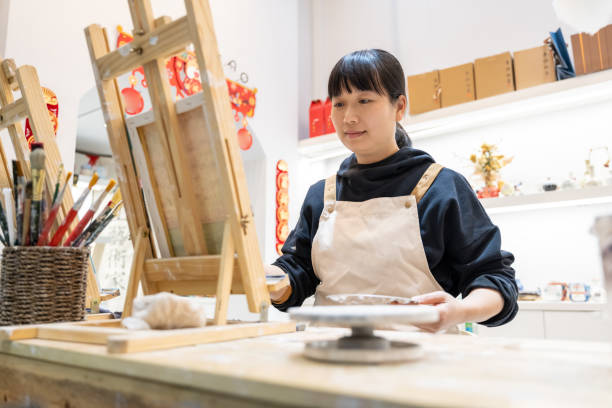 istock A woman is drawing in the studio 1576355244