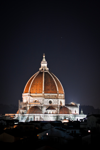 Night view of the Santa Maria del Fiore church - Duomo di Firenze (Tuscany, Italy). The Dome was built in 1420-1436 by Filippo Brunelleschi and it's one of the most enduring symbols of the Italian Renaissance.