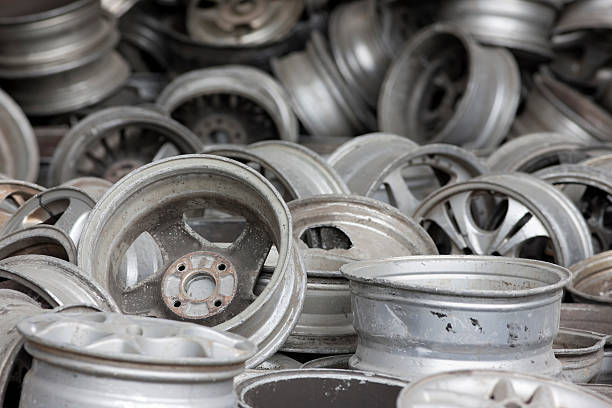 istock Old aluminum car wheel rims ready for recycling. 157635619