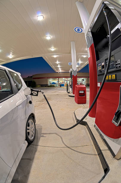 istock Small Car Refueling at Gas Station Convenience Store 157635895