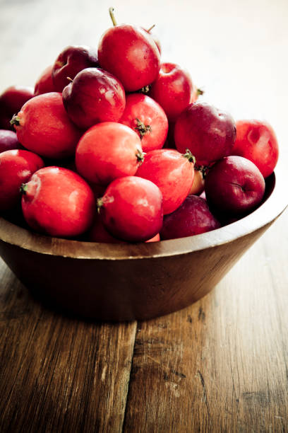Crabapples Many crabapples in a bowl. Selective focus. Natural light. antique fruit bowl stock pictures, royalty-free photos & images