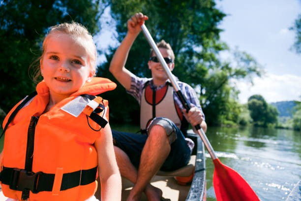 istock young family canoeing 157636338