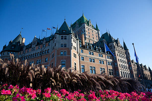 Chateau Frontenac With Flowers In Summer, Quebec City Chateau Frontenac With Flowers In Summer, Quebec City chateau frontenac hotel stock pictures, royalty-free photos & images