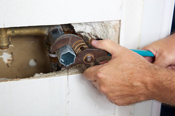 istock Leaking Shower Fixed using Channel Locks and Faucet wrench 157636390