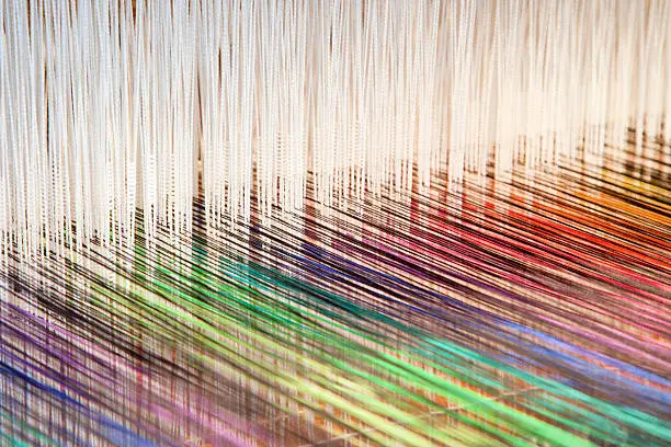 Colorful threads on an old-fashioned loom (XXL)
