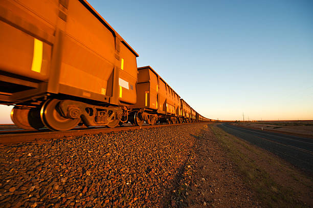 istock Iron Ore Train Cars close up 157636477