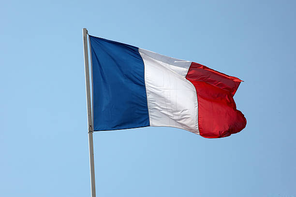French flag in a blue sky French flag in a blue sky french flag photos stock pictures, royalty-free photos & images