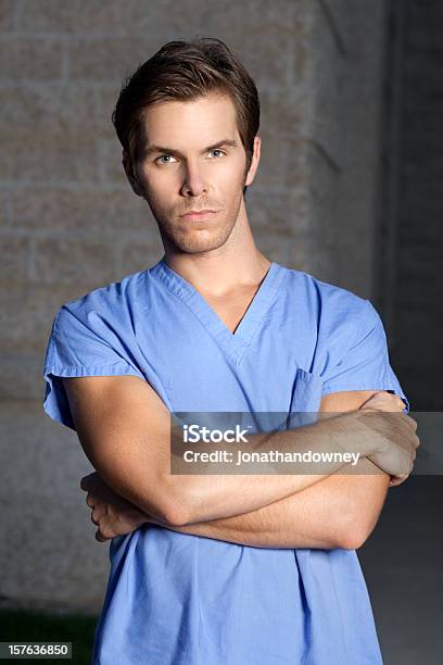 Young Man In Scrubs Stock Photo - Download Image Now - Arms Crossed, Nurse, Only Men