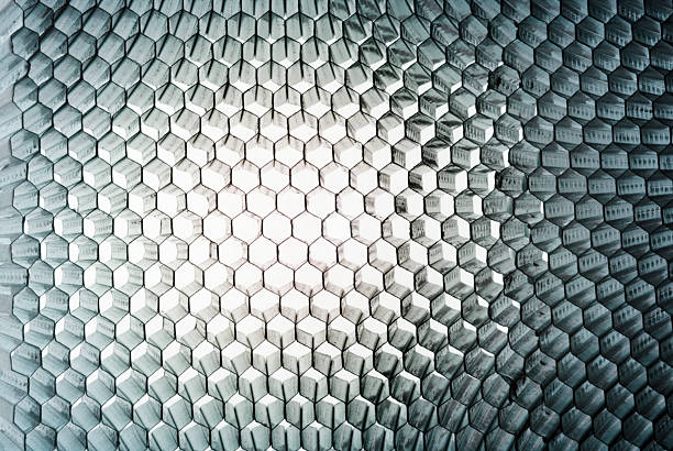 Honeycomb panel close-up, abstract texture with light Studio close-up of a honey-comb metal panel, light-weight, sturdy and flexible. Colour-Toned. AdobeRGB wire mesh photos stock pictures, royalty-free photos & images