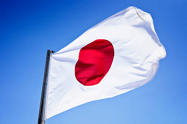 Japanese flag on pole stock photo