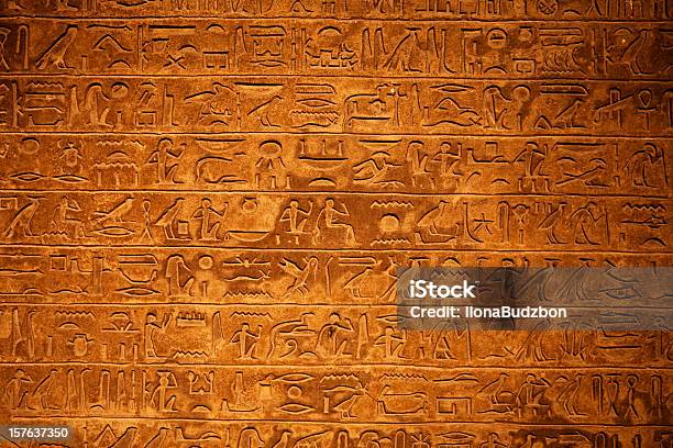Egyptian Hieroglyphics On A Beige Stone Stock Photo - Download Image Now - Hieroglyphics, Egyptian Culture, Ancient Egyptian Culture