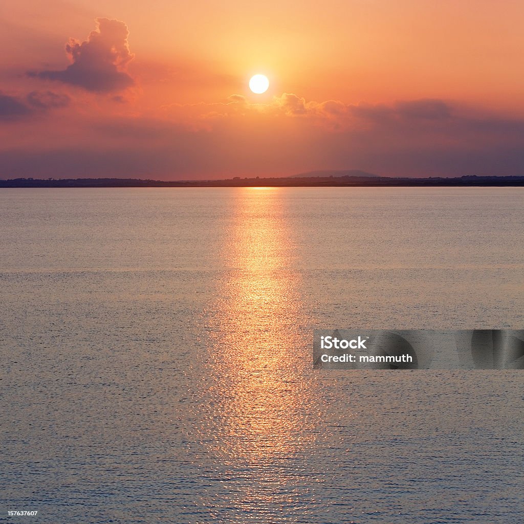 Puesta de sol en el mar - Foto de stock de Agua libre de derechos