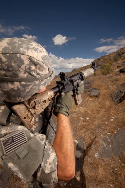 istock Special ops military soldier shooting an assault rifle 157637817