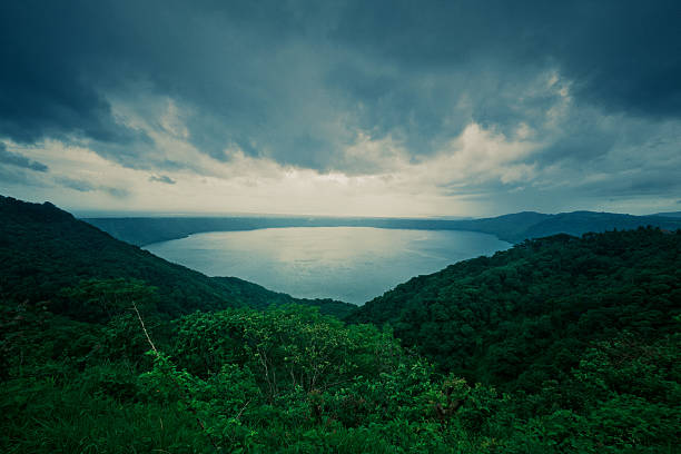 Masaya Volcano crater lake  in Nicaragua Masaya Volcano crater lake - one of 14 craters fill with water - part of the Masaya Volcano National Park, granada NIcaragua. nicaragua stock pictures, royalty-free photos & images