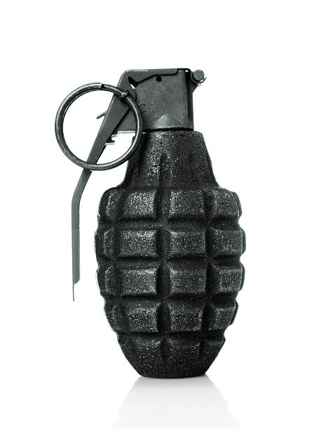Black hand grenade with safety pin attached Hand grenade pineapple style on a white background hand grenade photos stock pictures, royalty-free photos & images