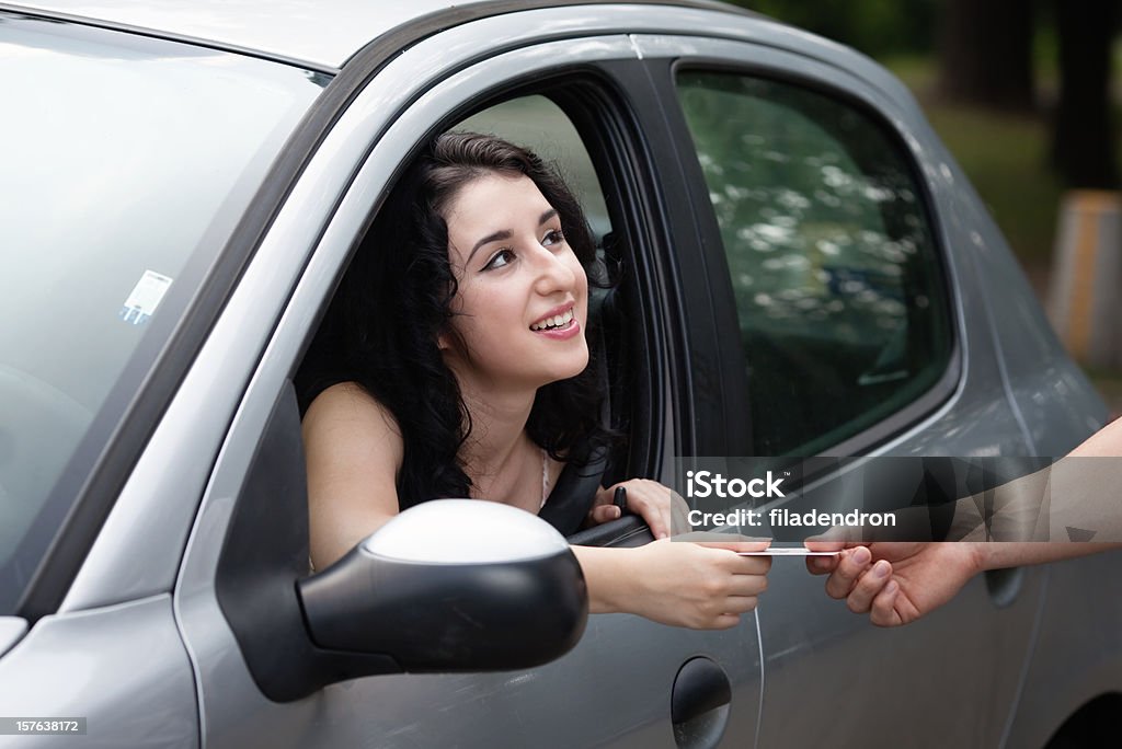 Woman gives your Driver's License for verification Driver's License Stock Photo