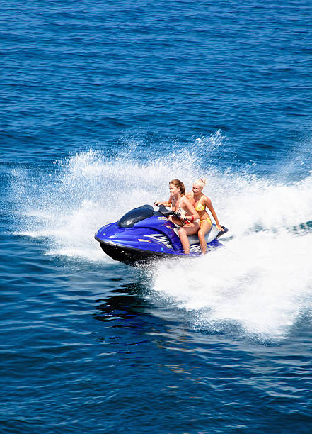 istock Beautiful women riding a sky-jet 157638365