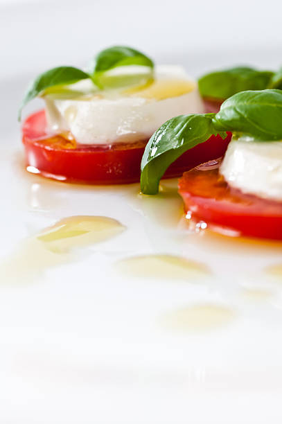 insalata caprese - mozzarella tomato salad italy foto e immagini stock